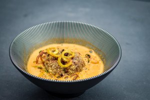 picture is showing the served meatball with tomatofoam
